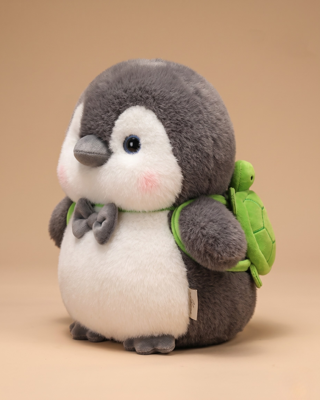 Adorable Fluffy Penguin Plush Toy with Bow Tie & Green Backpack Straps
